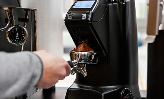 Slow flow of water into the coffee maker